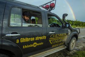 ON THE ROAD: Director Abbas Akbar in the Ford Endeavor SUV used in his road trip from Chennai to Singapore. 