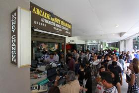 FRENZY: Money changers saw a lot of customers buying Malaysian ringgit yesterday following the currency&#039;s tumble to a 12-year low. 