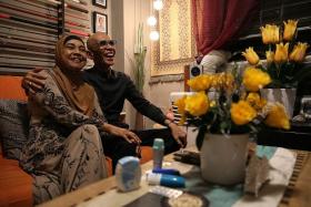 PILLAR OF SUPPORT: Mr Hanafi Mohammad Noor and his wife, Madam Jainah Sapnan, at their flat in Pipit Road. On the table are the medication he takes.