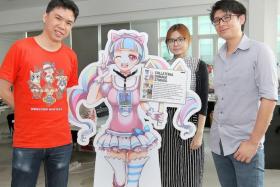 TEAM EFFORT: Collateral Damage Studios co-founder and general manager Ng Kian Chuan (right) and his team, Mr Low Zi Rong (left) and Ms Tan Hui Tian.