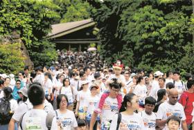 SAY CHEESE: The Big Walkers took the opportunity to take photos and selfies with the animals during the event. 

