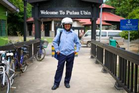 Mr Salleh, the Postman of Pulau Ubin. 