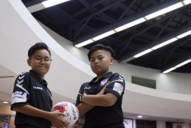 Danial Feroz of Swiss Cottage Secondary (left) and Tan Yu Hen of Hong Kah Secondary were picked to attend Yuhua Albirex Football Academy training and cultural tour in Niigata, Japan, where the parent club of S-League champions Albirex Niigata is based.