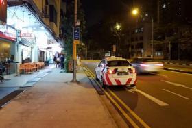 The photo of the police car parked next to a parking enforcement camera was posted on Facebook.