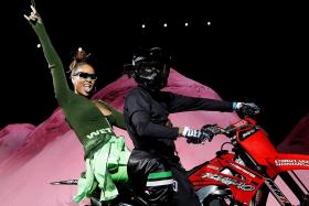 Rihanna rides into NY Fashion Week