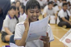 A Spectra Secondary student with her results. 