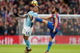 Manchester City striker Gabriel Jesus (left, being tackled by Crystal Palace's Andros Townsend) hurt his knee ligaments during their match against Palace on Dec 31.