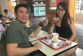 Mr Leon Dai and his wife at KFC Hougang Mall yesterday. 