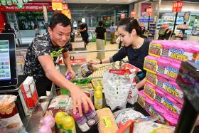 Grab drivers grab groceries in supermarket dash