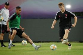Matthijs de Ligt (right) taking part in his first training session with Juventus at the Bishan Stadium on Saturday.