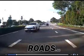 Two cars race along CTE during morning rush hour