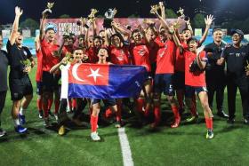 Johor Darul Ta'zim celebrating after winning the U-15 International Champions Cup, an invitational tournament organised by the Football Association of Singapore.