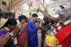 15,000 brave rain for temple&#039;s consecration ceremony 