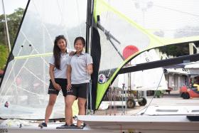 Sailors Kimberly Lim, Cecilia Low improvise to overcome limitations