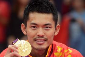 Lin Dan with his second Olympic gold medal, after defeating Malaysia’s Lee Chong Wei in the singles final at the 2012 London Games.