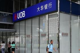 UOB to freeze wages, slow hiring amid pandemic fallout