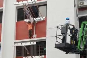 Worker saves 6-year-old boy trapped on ledge of block