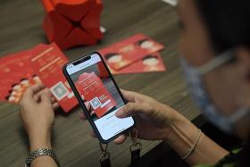 Banks see surge in number of e-hongbao given out this CNY