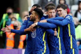  Chelsea&#039;s Reece James (far left) celebrates scoring their first goal with teammates.