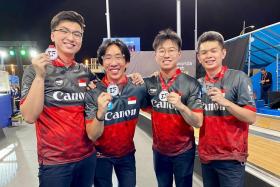 From left: Jonovan Neo, Jomond Chia, Cheah Ray Han and Darren Ong bagged a historic silver medal at the IBF Super World Championships in Dubai.