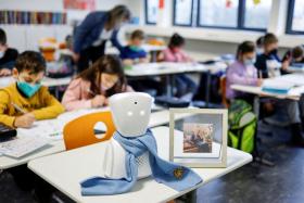 German schoolboy Joshua Martinangeli's robot avatar attending class in Berlin.