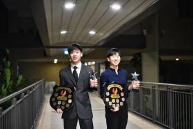 Izaac Quek (left) and Zhou Jingyi were awarded the Moo Soon Chong Outstanding Student-Athlete of the Year (Secondary).