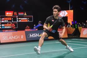 Singapore shuttler Loh Kean Yew loses 21-6, 21-14 to Malaysia&#039;s Lee Zii Jia in the Badminton Asia Team Championships Group B opener, on Feb 16, 2022. 
