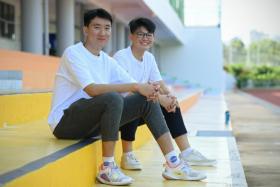 Jurong Pioneer JC student Xu Zhetai (left) suffered a cardiac arrest during basketball training in 2021. His best friend Joshua Lim was one of the first responders. 
