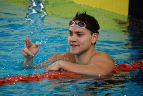 Joseph Schooling touched the wall in 52.22 seconds at the My Dinh Water Sports Palace to claim the top spot. 