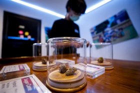 Cannabis for sale is displayed at a cafe in Bangkok on Sept 12, 2022. 