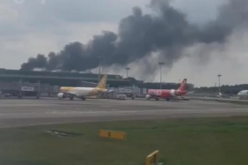 The video showed the thick plumes coming from Changi Airport Terminal 1.