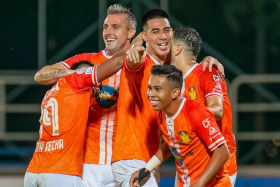 Hougang United's players celebrating during their Singapore Cup semi-final, second leg win over Albirex Niigata. 
