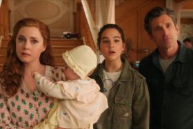 Amy Adams (left) and Patrick Dempsey (right) are joined by Gabriella Baldacchino (middle) in Disenchanted.