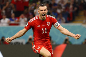 Gareth Bale celebrates scoring Wales' first goal against USA at World Cup 2022.
