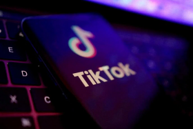 TikTok can be asked to tag misleading information with notices, as well as restrict access to content from specific users to Singaporeans. PHOTO: REUTERS
