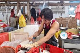 Teo Ting Zhou, 21, helps to manage his father&#039;s business at Marsiling Market from Tuesday to Sunday, 5am to 12.30pm.