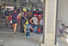 The buskers at the busy Ang Mo Kio Central Market & Food Centre.