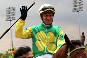 Aniki (Vlad Duric) posing at the winner&#039;s gate after his impressive victory on Nov 25. Having thrived, the Alwin Tan-trained four-year-old gelding can make it back-to-back successes in Race 11 on Dec 30.