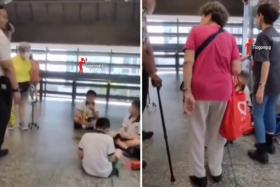 Schoolboy yells at elderly woman at MRT station