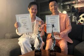 Peter Yu (left) and Mark Lee, who star in the locally produced film Wonderland, won awards for Best Supporting Actor and Best Actor respectively at the Ho Chi Minh City International Film Festival.