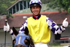 Former Macau-based French jockey Charles Perkins returning to scales after his first win in Singapore aboard the Jerome Tan-trained Sacred Gold on May 12. The Japanese-bred was also opening his account at Kranji.