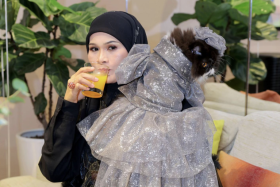 Entrepreneur Haliza Maysuri with Money.