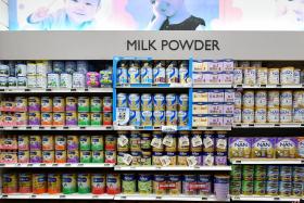 Woman with toddlers hid stolen milk powder under pram