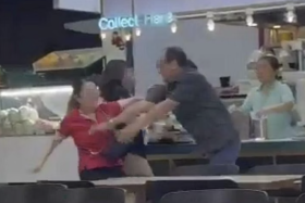 Patrons tried to stop the fight between the two beer promoters.