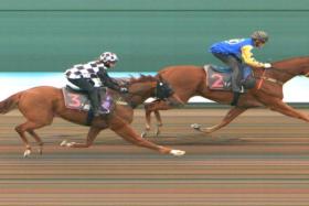 Maiden Strong Ace (Saifudin Ismail) holding off Sky Eight (Jerlyn Seow) to take Trial No. 3 on June 27.

