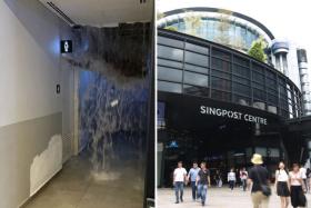 A girl was trapped inside a toilet after a burst pipe released a &#039;waterfall&#039; at SingPost Centre. 