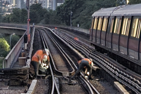SMRT staff checking the tracks.