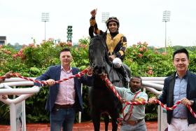 Trainer James Peters leading in Bransom (Bruno Queiroz) after the son of Brazen Beau won a Class 4 race over 1,000m on the Polytrack at Kranji on June 1. A Class 3 contest over 1,000m on the same surface beckons on July 13.