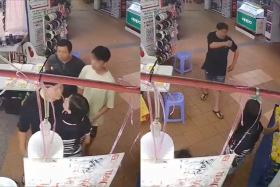 A man, who boasted of affiliations with a gang, slapped a durian seller and challenged another to a fight.