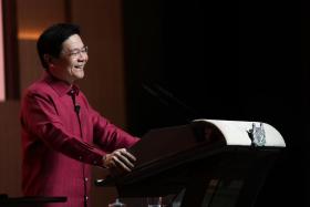 From the moment PM Lawrence Wong stepped onto the stage, he radiated an almost contagious energy.